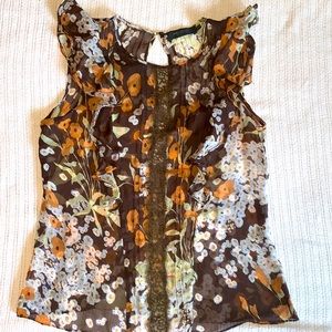 Silky top, butterfly wing frills, lace center front & back